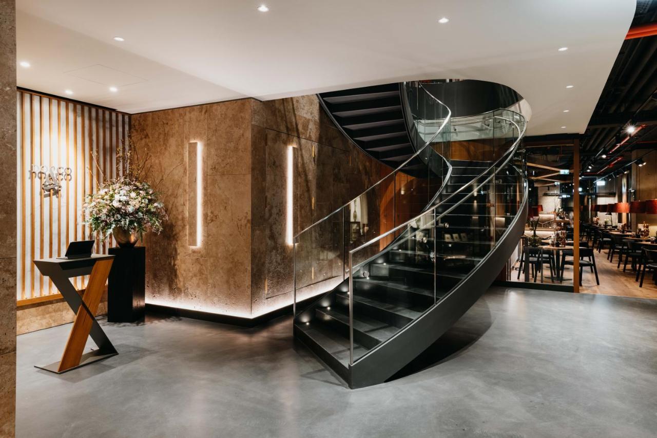 DO&CO Hotel München Exterior foto The interior of the restaurant