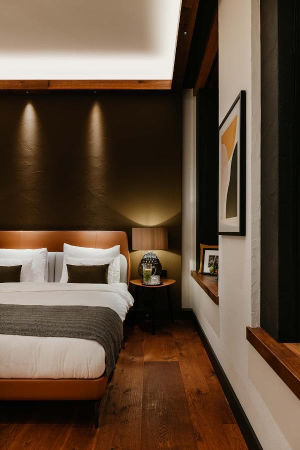 DO&CO Hotel München Exterior foto A bedroom at the hotel