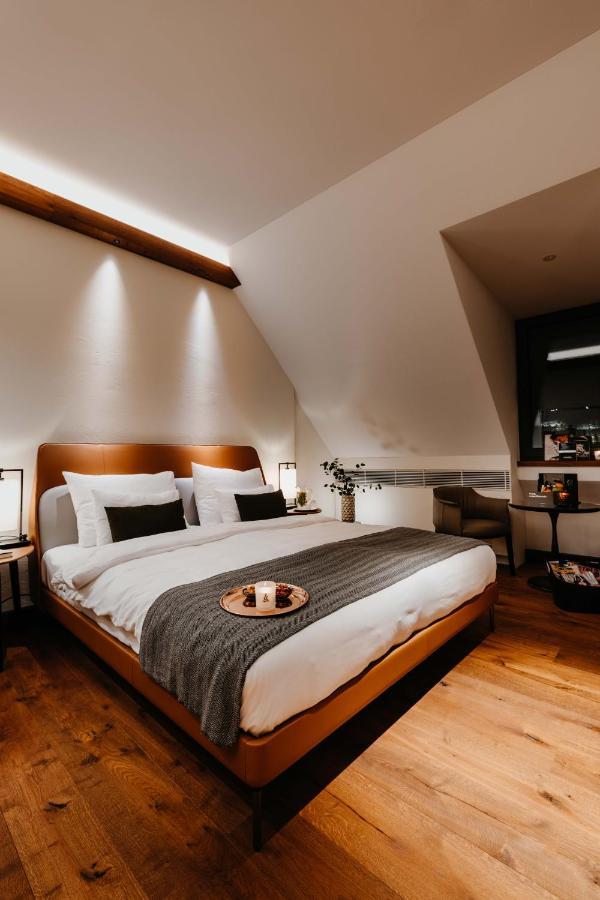 DO&CO Hotel München Exterior foto A bedroom at the hotel