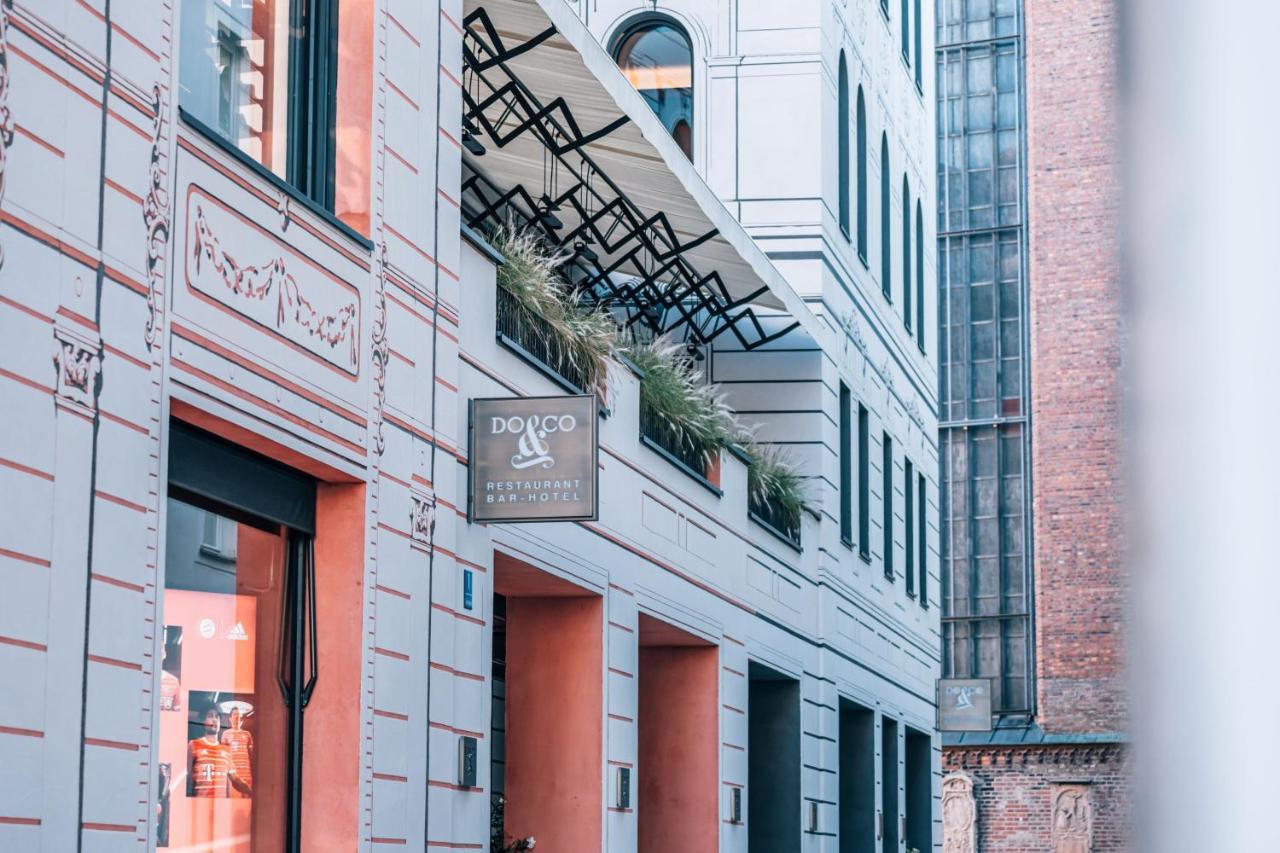 DO&CO Hotel München Exterior foto The exterior of the hotel